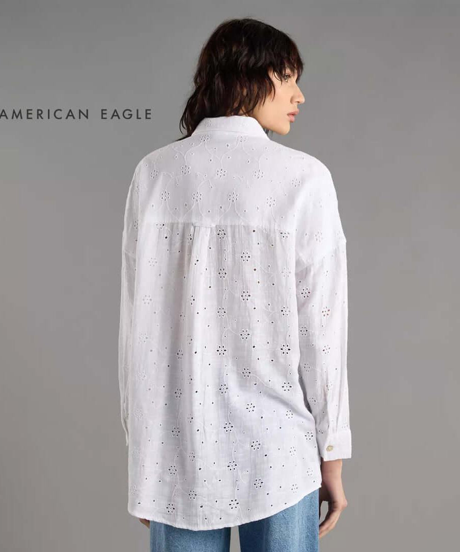 Back view of American Eagle loose fit eyelet shirt, featuring delicate embroidery in a stylish oversized design.